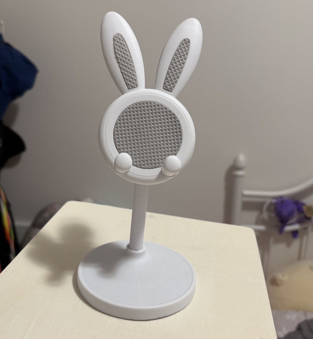 A phone stand, the interaction would be putting the phone in the stand.